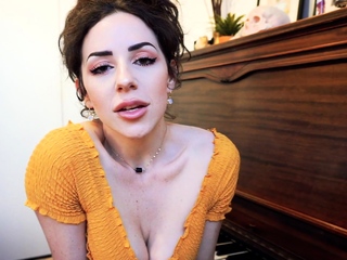 Busty curly brunette with big boobs fucks on couch